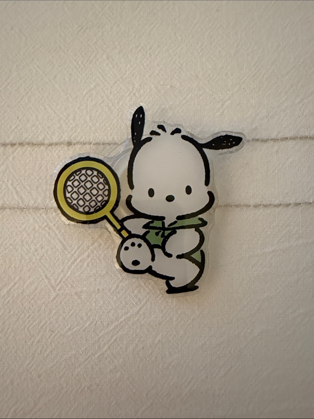 Sanrio White Puppy Tennis Pin with Green Outfit and Yellow Racket